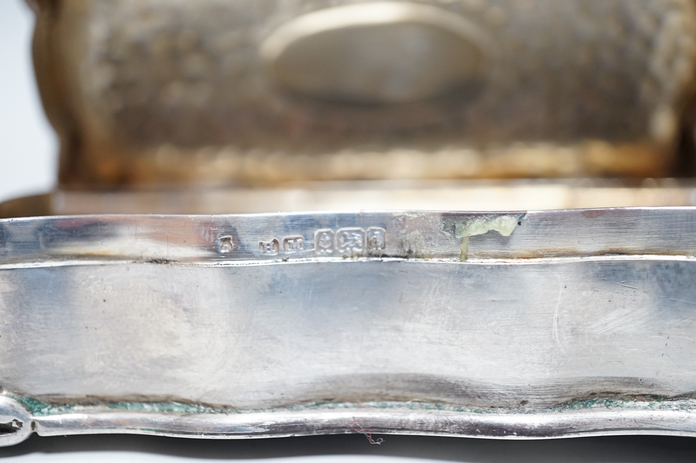 A George V silver and tortoiseshell mounted circular trinket box, Walker & Hall. Birmingham, 1918, 92mm and an earlier silver rectangular trinket box.